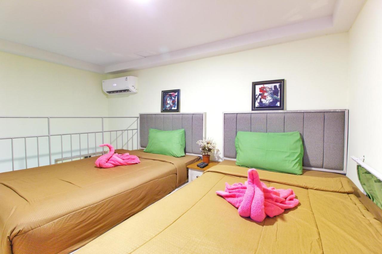 Urbanest Inn House Slipi Jakarta Zimmer foto